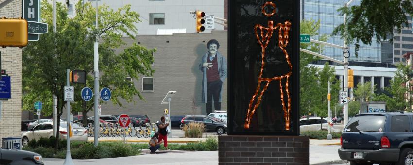 , "Ann Dancing" (2007) is a piece of art by Julian Opieissioned by the Indianapolis Cultural Trail, Inc.